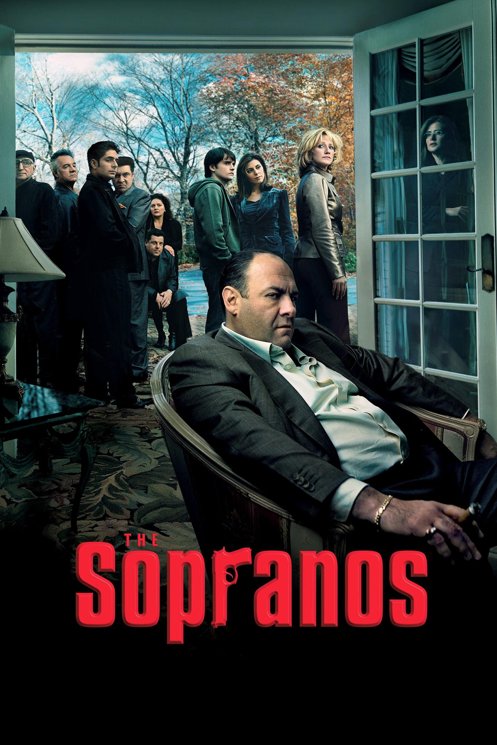 Ein Mann sitzt drinnen in einem Sessel und blickt ernst, während eine Gruppe von Menschen vor einer Glastür steht. Unten steht in fetten roten Buchstaben der Schriftzug „The Sopranos“, der an die klassische Serie erinnert, die nun über IPTV Kaufe gestreamt werden kann.